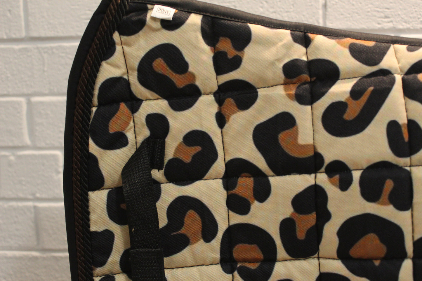 Leopard and Tiger Print Saddle Pads and Matching Sets with Bonnets and Boots in Dressage Jump & Close Cut