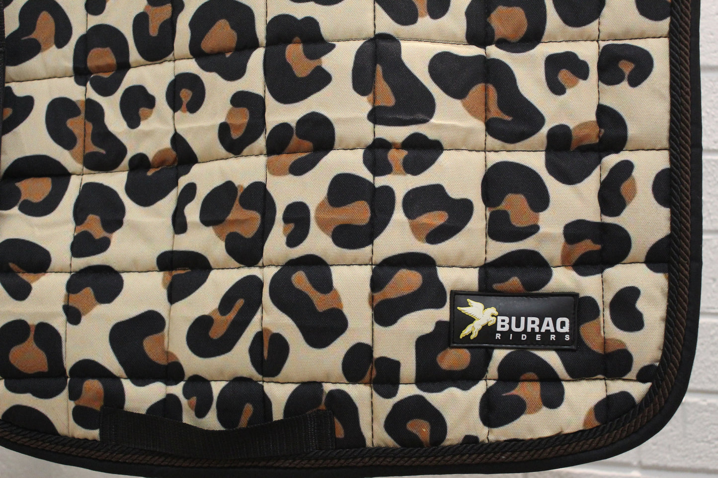 Leopard and Tiger Print Saddle Pads and Matching Sets with Bonnets and Boots in Dressage Jump & Close Cut